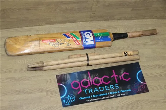 r119 (2). GM Gunn and Moore Cricket Bat, with stakes